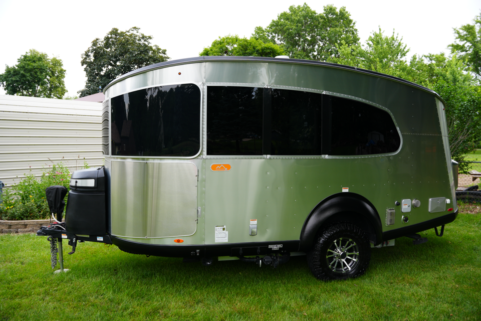 Driver-side profile showing X-Package wheels and stone guard
