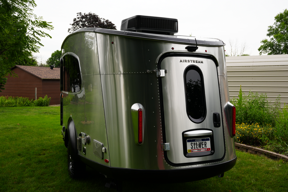 Rear view with gear hatch, Furrion backup camera, and Iowa plates