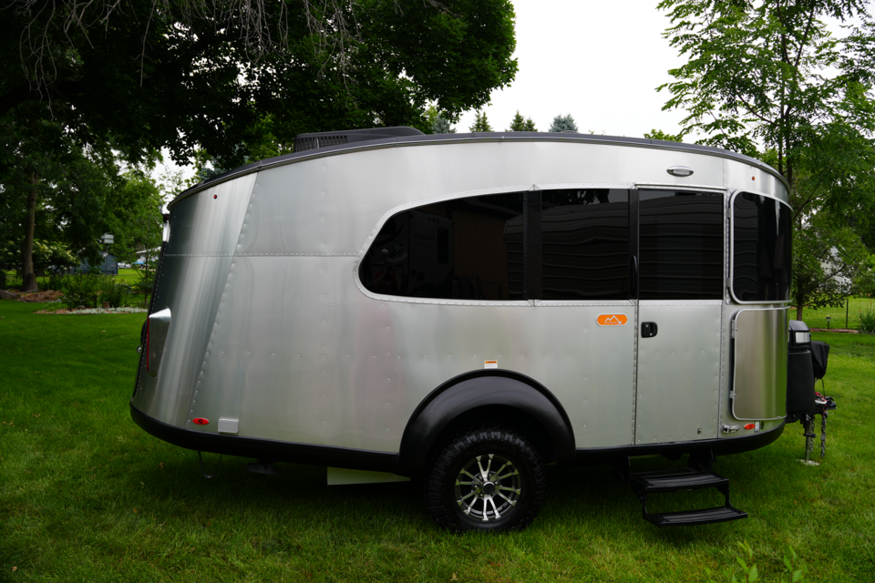 Passenger-side entry with fold-down steps